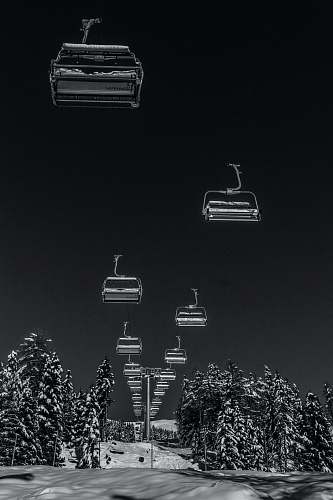 black-and-white gray scale photo of cable cars harmonica